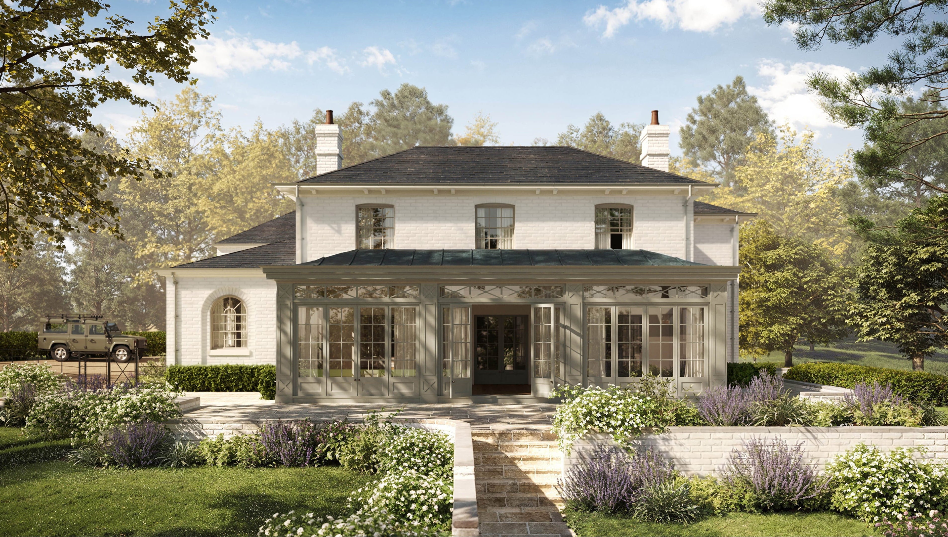 Elegant white brick house with a slate roof, large glass conservatory, and manicured gardens featuring lavender and white roses